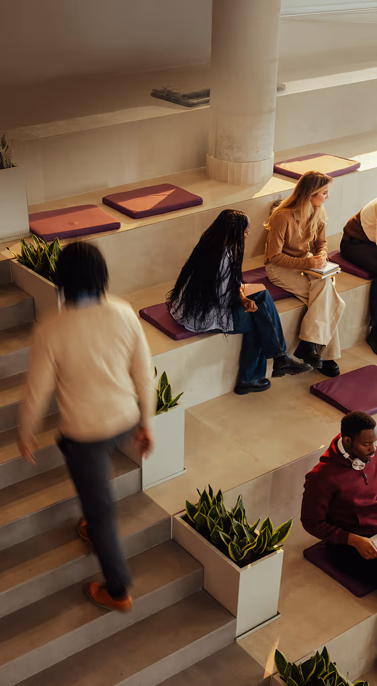 Students and staff in a university building